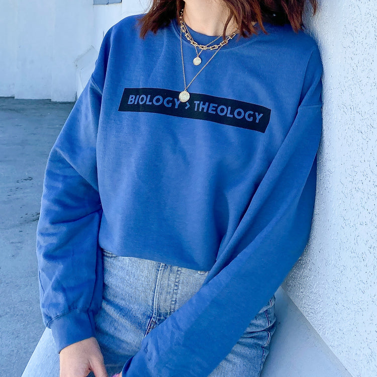 Biology > Theology Crewneck Sweatshirt